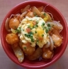 「明日の日替り弁当はイカチリ丼」