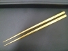 ちょっと重量のある金色に輝く立派な箸「買取専門 金のクマ 沼津店　箸をお買い取り　何と純金( ´艸｀)」