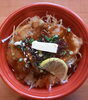 「明日の日替り弁当はバター醤油トンテキ丼」