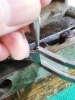ハトメを切断し、新しいピンをタガネ打ち。「オメガの三つ折りバンド直し(^O^)／」