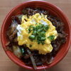 「明日の日替り弁当は豚玉丼」