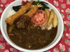 「本日のAランチは夏野菜エビフライカレーです」