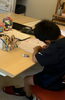 夏休みの宿題　勉強中「小学生対象　塾でもあり学童でもある　ミネルヴァこども学院　夏休み期間中の活動スタートです」