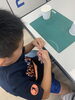 はりがね糸電話　作成中「小学生対象　塾でもあり学童でもある　ミネルヴァこども学院　夏休みの活動　科学館に行きました」