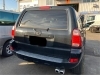 「黒いSUV（ハイラックスサーフ215系・CBA-TRN215W）が中古車として入庫！現車確認・ご相談歓迎」