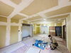 クロス施工前に下地を整えるパテ処理作業。「綾部市の補助金を活用した耐震補強工事🏠 クロス工事が始まりました👷‍♂️」