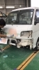 凹みをパテで埋めて凹凸を直しています。「軽トラックのフロントパネルの凹み修理。」