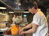活気あふれる店主が焼く絶品串「焼き台の主役！串を操る職人のスピードと手さばき」