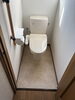 衛生的で落ち着けるトイレ空間「トイレ交換と内装リフォームで清潔・快適な空間に」