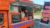 目印はorange。「魚沼のキッチンカー。ORANGEkitchenです。」