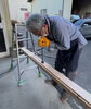 社長が腰痛にこらえ手づくりコースター制作している所「一関住宅祭は盛況のうちに終了いたしました！」
