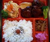 「明日の日替り弁当は白身魚のポテト焼き」