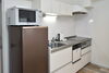 カフェルームのキッチン「ご家族の仮住まいに。リフォーム・引越し中の“もう一つの暮らし場”として」