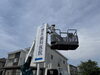 新しい看板をつける様子「増永歯科-誘導看板やりかえ工事」