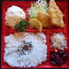 「明日の日替り弁当はバター醤油トンテキ丼」
