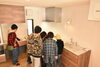 みんなで熱心に取り扱い説明を受けています。「【お引渡】福島市で、大規模リフォームを終えたＴ様邸は、無事年内にお引き渡しできました‼　笑顔いっぱいのお引渡でした‼　」
