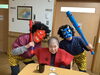 年女の入居者様、鬼と一緒に笑顔で写真に納まりました「豆まきをしました。」