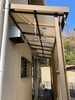 施工前：波板に穴が開いています「軒下テラスの波板取り替え工事【神戸市西区 リフォーム 便利屋】」