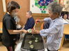 快く手伝ってくださるご利用者様「けんびき焼きを提供しました。」