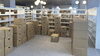 新図書館の書架に積み上げられています。「新図書館への道のり㉕」