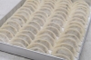 スタミナ餃子の生餃子の写真です。「ニンニクの量を30％増量しました！」