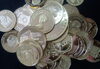 「フランクリン・ミント社製の金貨です。」