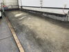 高圧洗浄施工前「雨の日は仕上げの高圧洗浄デー｜駐車場やブロックもスッキリきれいに！」