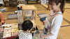 ガチャガチャを楽しむみなさま「[和歌山マルシェ]ゆるゆる会3周年レポート｜台風の中、過去最多のお客様にお越しいただきました」