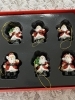 小さなサンタクロース「クリスマスセール開催中」