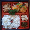 「明日の日替り弁当は鶏のオレンジ唐揚げ」