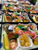 折詰弁当。お祭りにて。好評頂き。「岩牡蠣・新鮮な魚介類が人気です…」