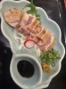 おおいた冠地どりモモたたき「はじめまして【明石 鍛冶屋町 元板前の居酒屋 ガッツリ飯 美味い おおいた冠地どり 大分料理 焼鳥 おすすめ 黒毛和牛 スパイスカレー 和食 麻婆豆腐 ⠀】」