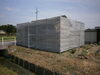 養生シートで解体する建物を覆います「池田町内で、足場・養生シートの設置、建物の解体を行いました。」