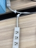 デスクごとにハーネス用OAタップ「東京タワー向かいのオフィスで、複雑な電気回路を調査しながらコンセント計画を実現しました」