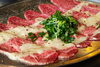 ツラミ(ネギ塩ダレ)「ツラミ（牛の頬肉）、程よいサシであっさりと！ネギ塩ダレも人気です」