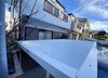 「足立区マンション駐輪場　鉄板小波屋根張り替え事例のご紹介」