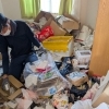 作業中「モノ屋敷・ゴミ屋敷のご相談増えてます」