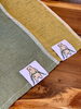 タグにコンクマの刺繍「サウナの相棒！コンクマタオル、いかかですか？🐻」