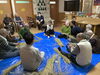 左端の入居者様が先生「しめ飾りを作りました」