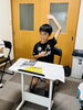 元気いっぱいに学ぶ子供たちの姿「月1回のSpecial Dayで「こども新聞」作文に挑戦しました」