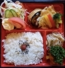 「明日の日替り弁当は酢鶏」