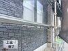 「石積み調外壁の上塗り完了｜立体感と防水性を両立した仕上がり」