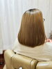 色気あふれる艶髪カラー「毛先までやわらかく。ココナッツ縮毛矯正で自然なストレートに」